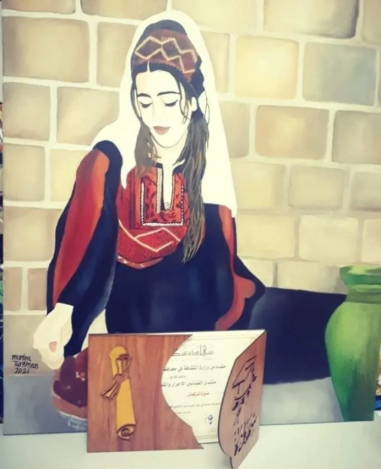 منيرة تركمان فنانة تشكيلية من بلدة جسر الزرقاء 