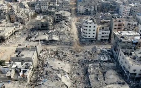 انهيار مبنيين متضررين من قصف إسرائيلي سابق بمدينة غزة بفعل المنخفض