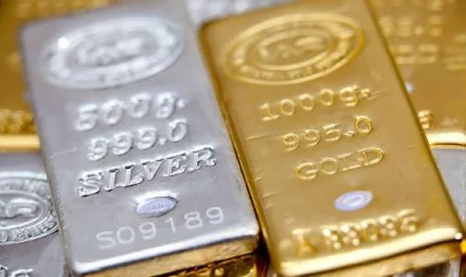 أسعار الذهب والفضة تهوي لأدنى مستوى في شهر
